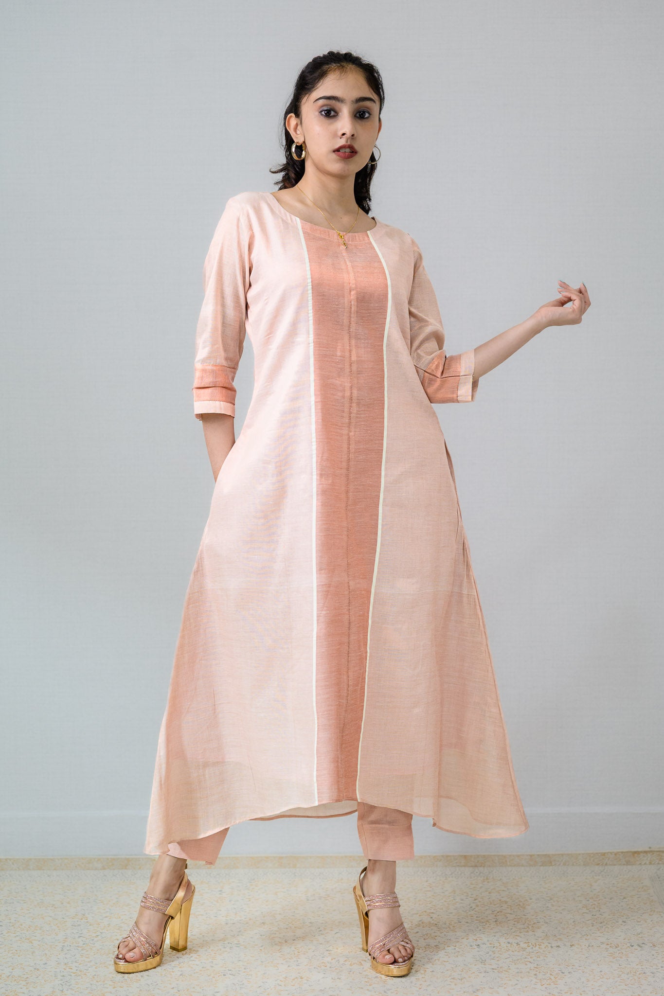 Kasavu Elegance Copper Tissue High Low Kurta- Lobha Deepthis Kasavu Elegance Copper Tissue High Low Kurta- Lobha Deepthis