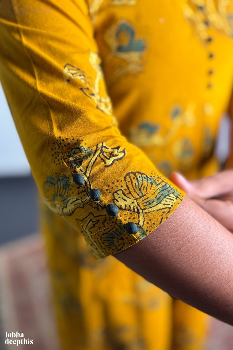 Ajrakh Blooms on Turmeric Box Pleated Dress - Lobha Deepthis