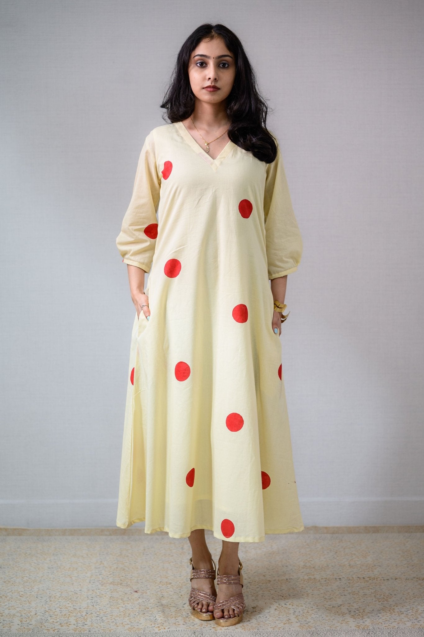 Red Polkas on Cream Dress - Lobha Deepthis