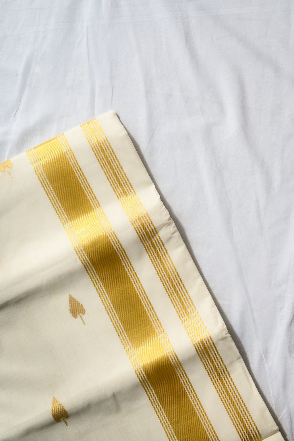 Golden Kasavu Butas Balaramapuram Handloom Saree with Modal Ajrakh Blouse