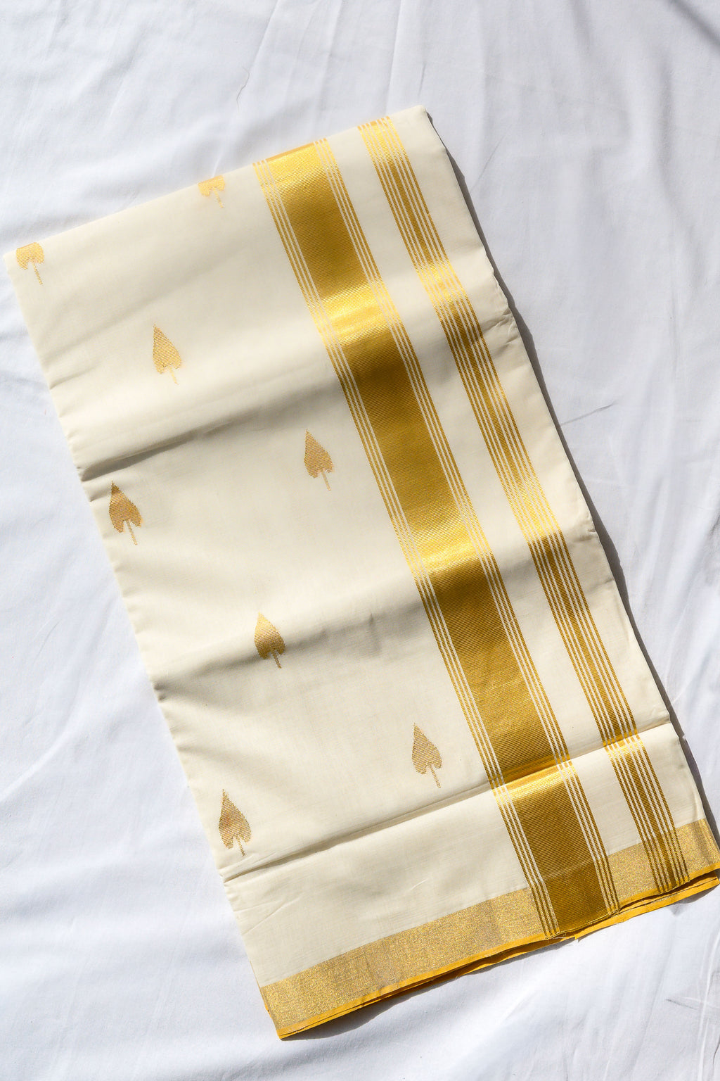 Golden Kasavu Butas Balaramapuram Handloom Saree with Modal Ajrakh Blouse
