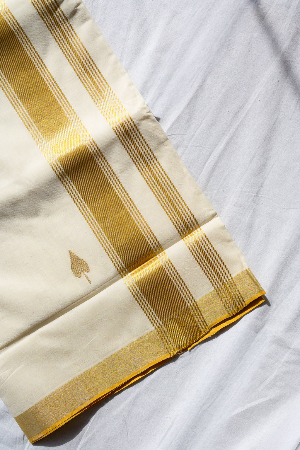 Golden Kasavu Butas Balaramapuram Handloom Saree with Modal Ajrakh Blouse