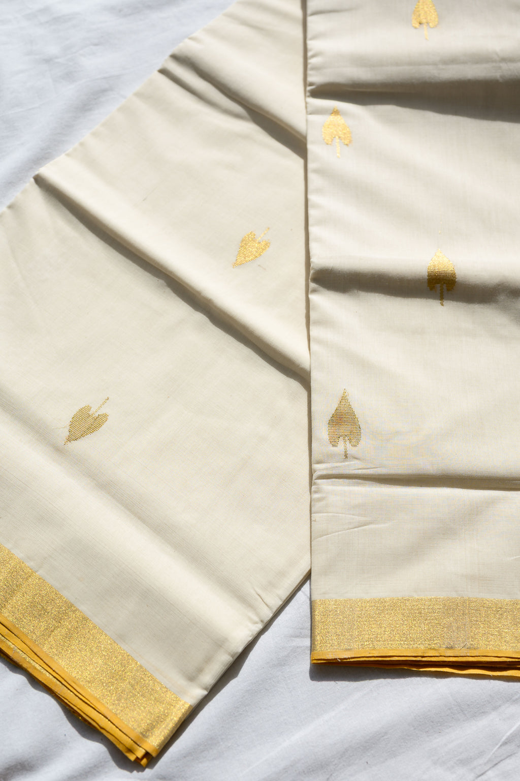 Golden Kasavu Butas Balaramapuram Handloom Saree with Modal Ajrakh Blouse