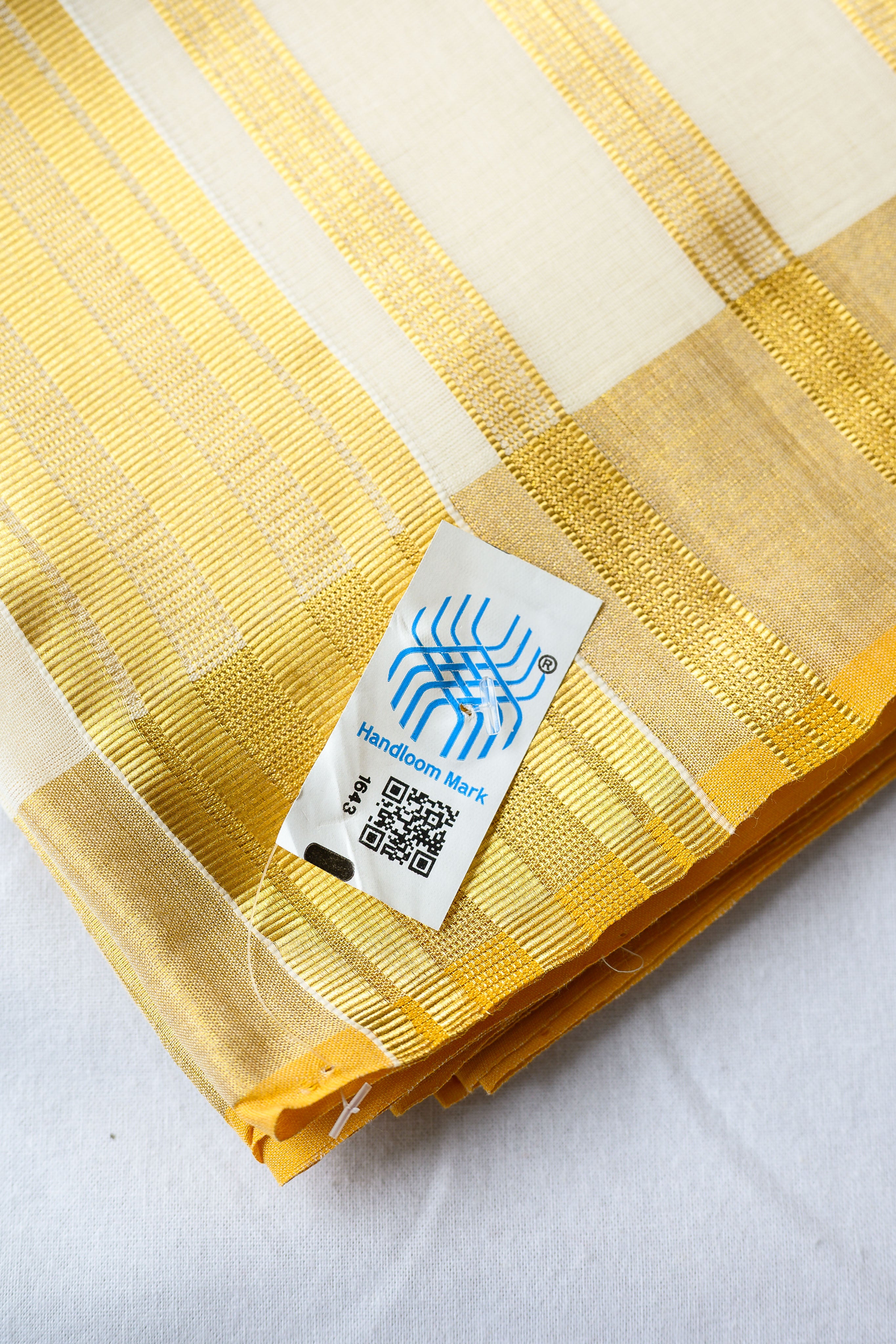 Golden Polka Lines Balaramapuram Handloom Saree with Modal Ajrakh Blouse