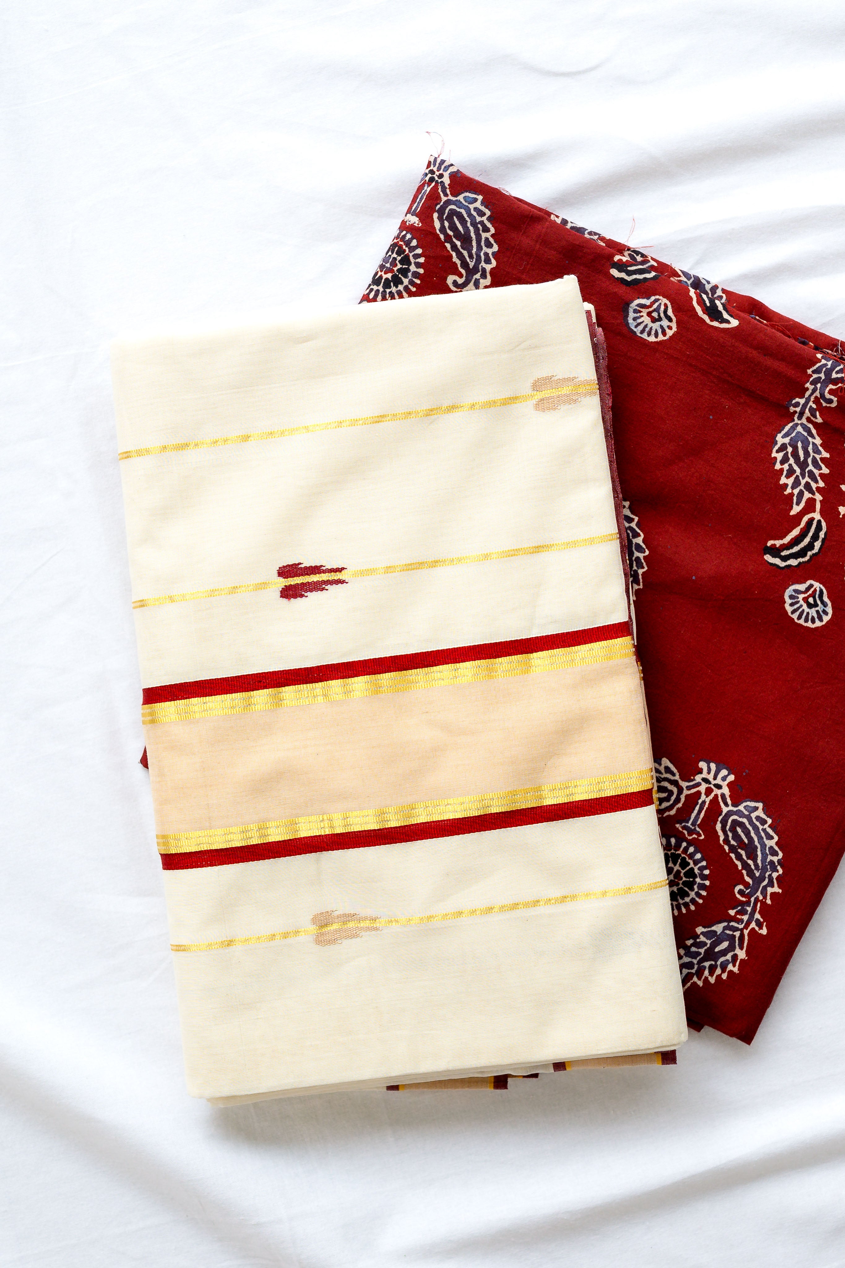 Maroon- Golden Borders and Lines Balaramapuram Handloom Saree with Ajrakh Blouse