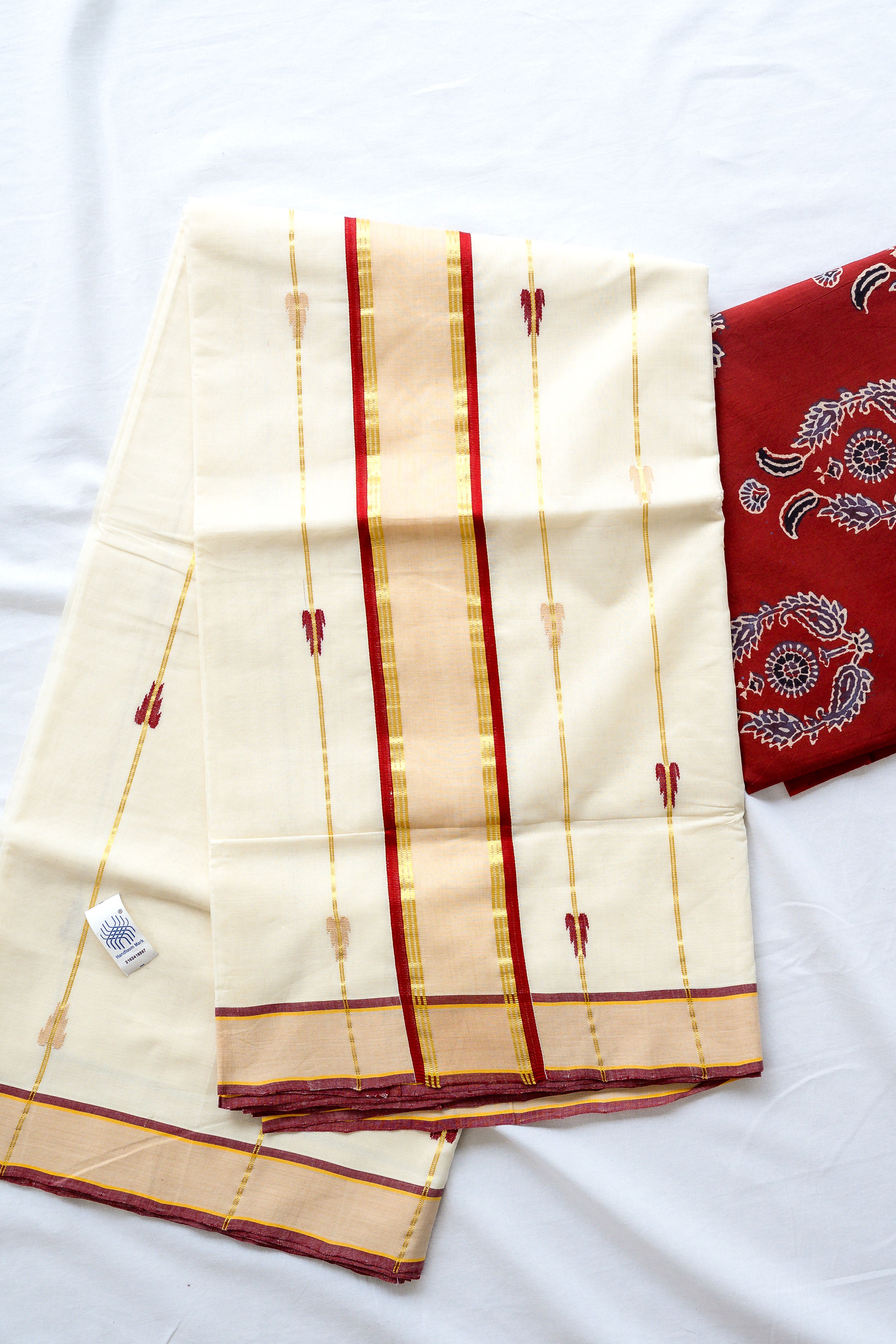 Maroon- Golden Borders and Lines Balaramapuram Handloom Saree with Ajrakh Blouse