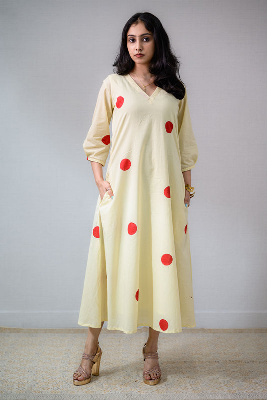 Red Polkas on Cream Dress
