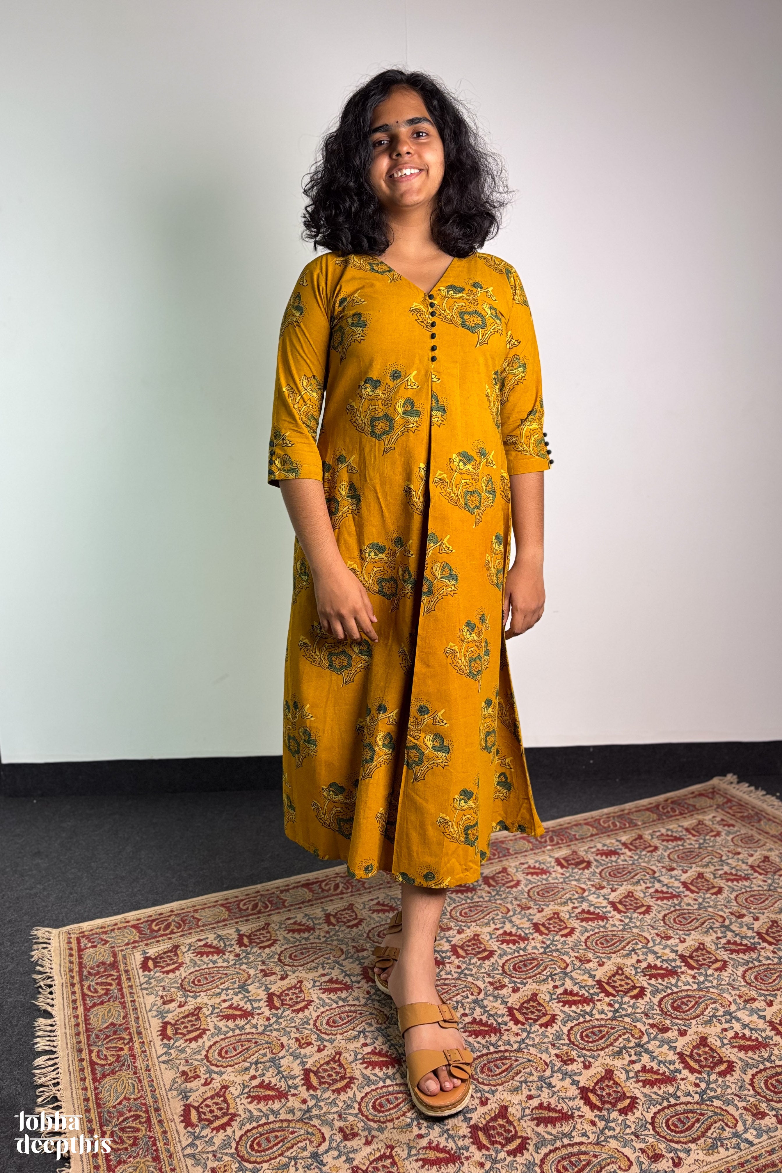 Ajrakh Blooms on Turmeric Box Pleated Dress
