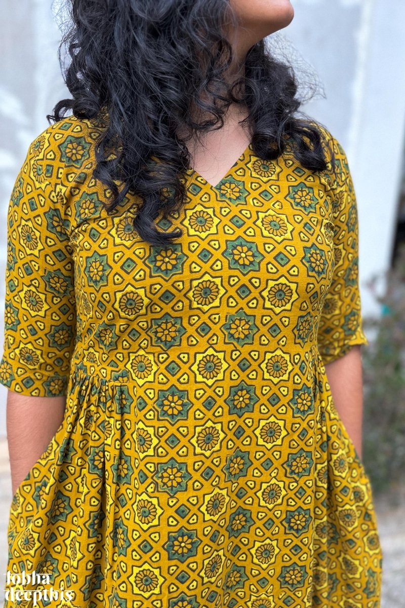 Ajrakh Stars on Turmeric Dress - Lobha Deepthis