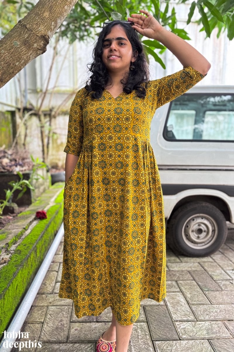 Ajrakh Stars on Turmeric Dress - Lobha Deepthis