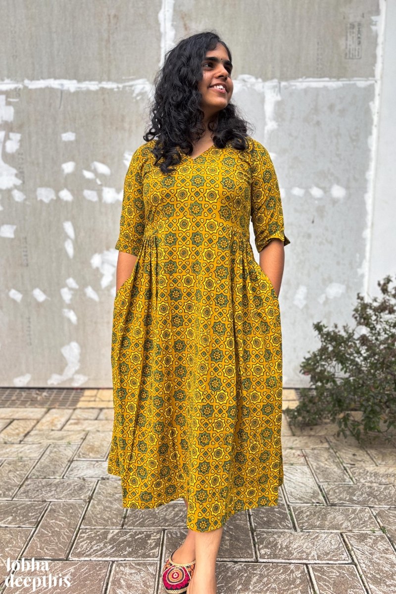 Ajrakh Stars on Turmeric Dress - Lobha Deepthis