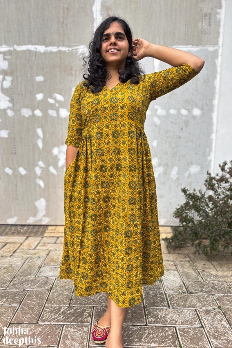 Ajrakh Stars on Turmeric Dress - Lobha Deepthis