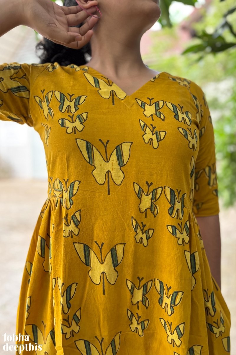 Butterflies on Turmeric Ajrakh Dress - Lobha Deepthis