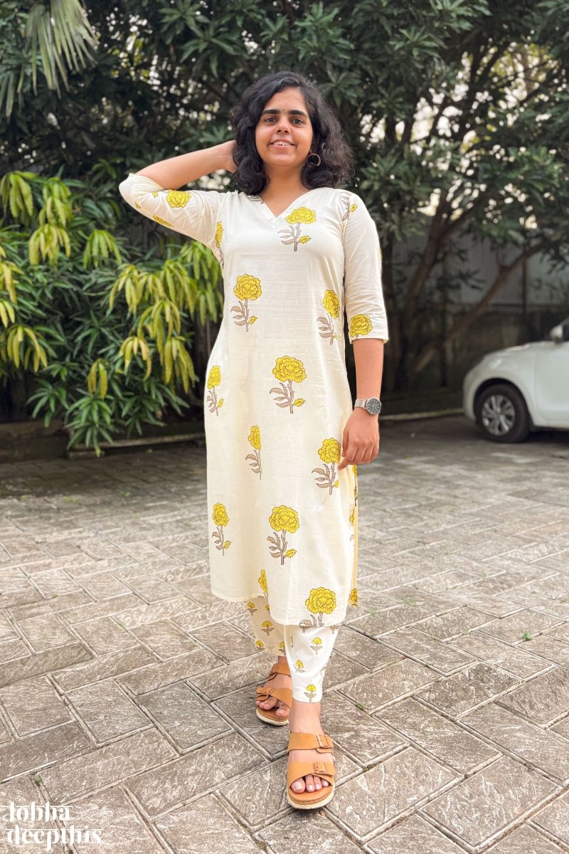 Jamanthi on Cream Sanganeri Straight Kurta - Lobha Deepthis