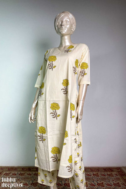 Jamanthi on Cream Sanganeri V Neck Kurta - Lobha Deepthis