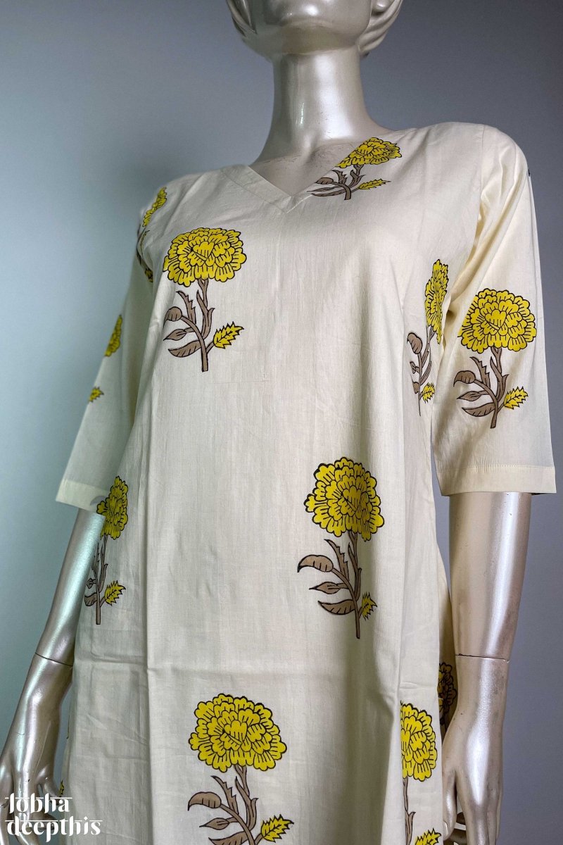 Jamanthi on Cream Sanganeri V Neck Kurta - Lobha Deepthis