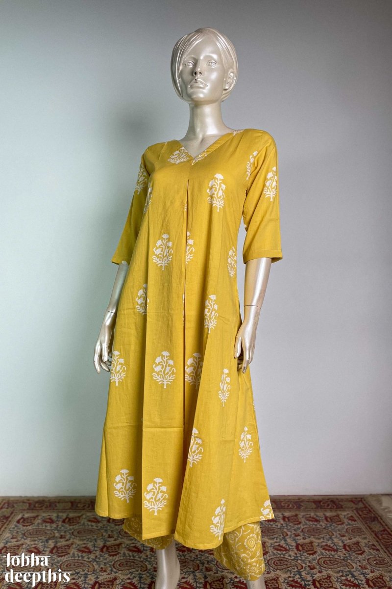 Jamanthi on Yellow Sanganeri Box Pleated Kurta - Lobha Deepthis