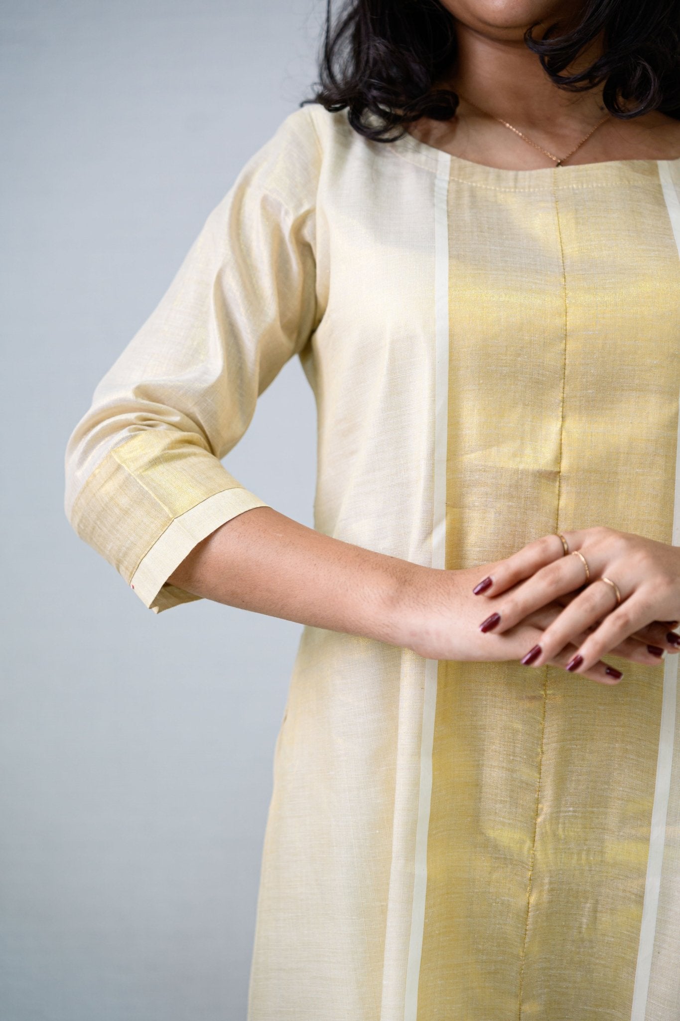 Kasavu Elegance Golden Tissue High Low Flared Kurta- Lobha Deepthis Kasavu Elegance Golden Tissue High Low Flared Kurta- Lobha Deepthis