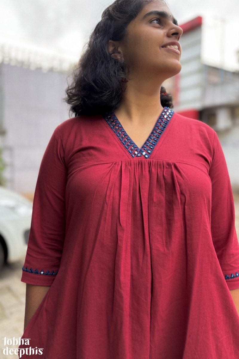 Mirrors on Maroon Dress - Lobha Deepthis