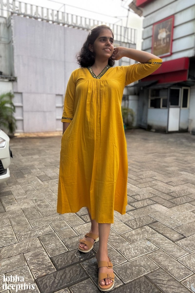 Mirrors on Mustard Dress - Lobha Deepthis