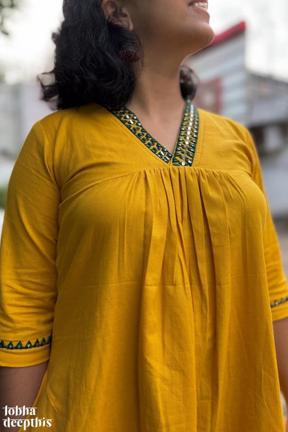 Mirrors on Mustard Dress - Lobha Deepthis