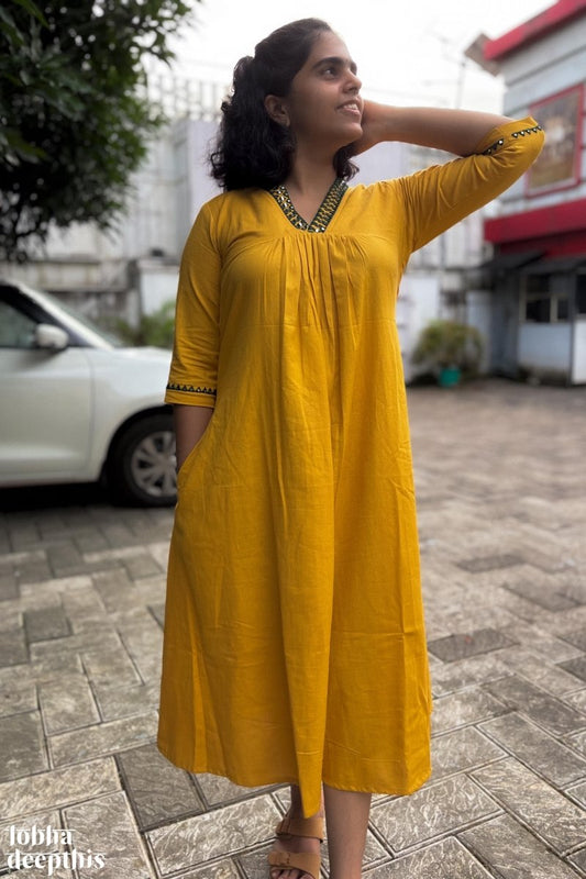 Mirrors on Mustard Dress - Lobha Deepthis