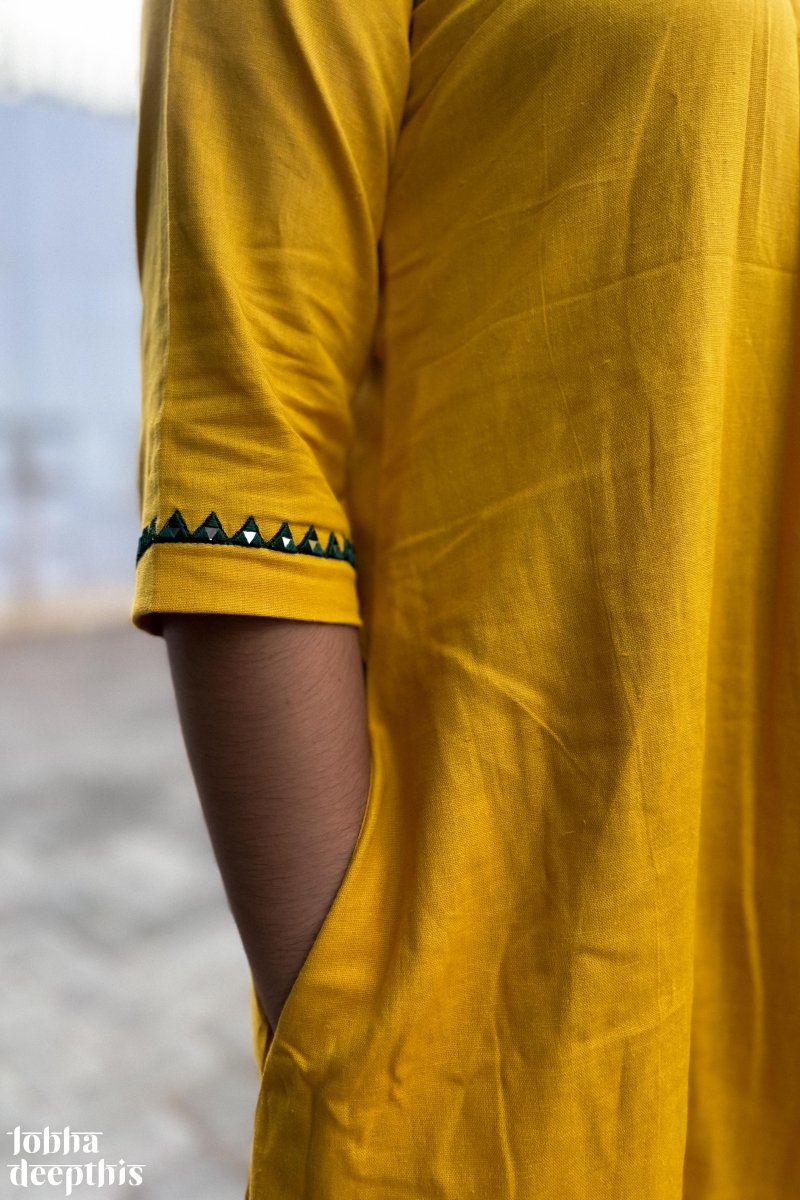 Mirrors on Mustard Dress - Lobha Deepthis