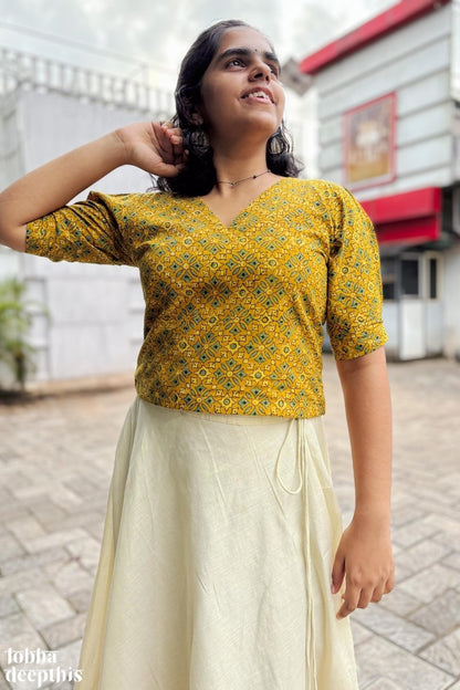 Turmeric Ajrakh and Golden Tissue Onam Skirt & Top Set - Lobha Deepthis