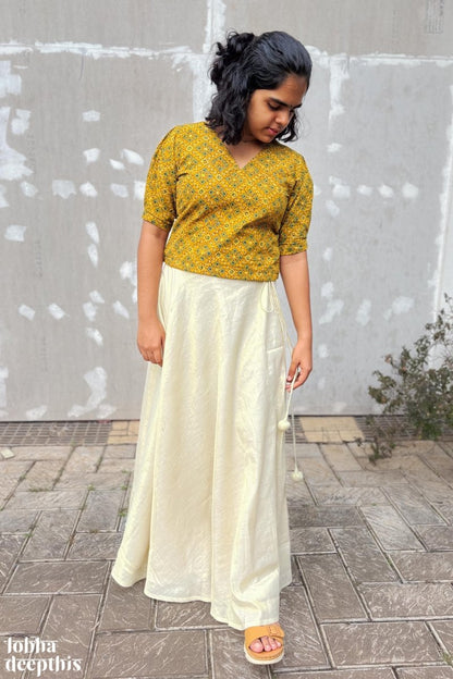 Turmeric Ajrakh and Golden Tissue Onam Skirt & Top Set - Lobha Deepthis