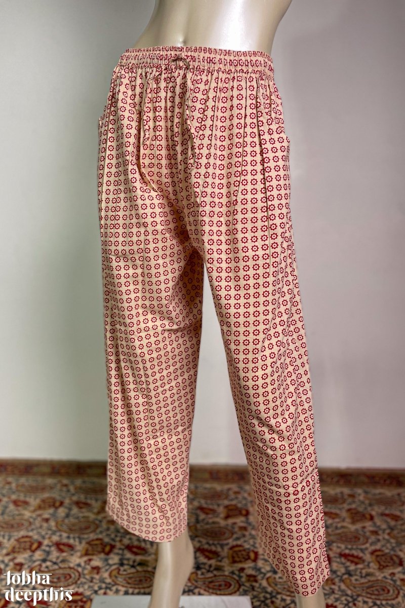 Red Stardust on Cream Cotton Straight Pants - Lobha Deepthis